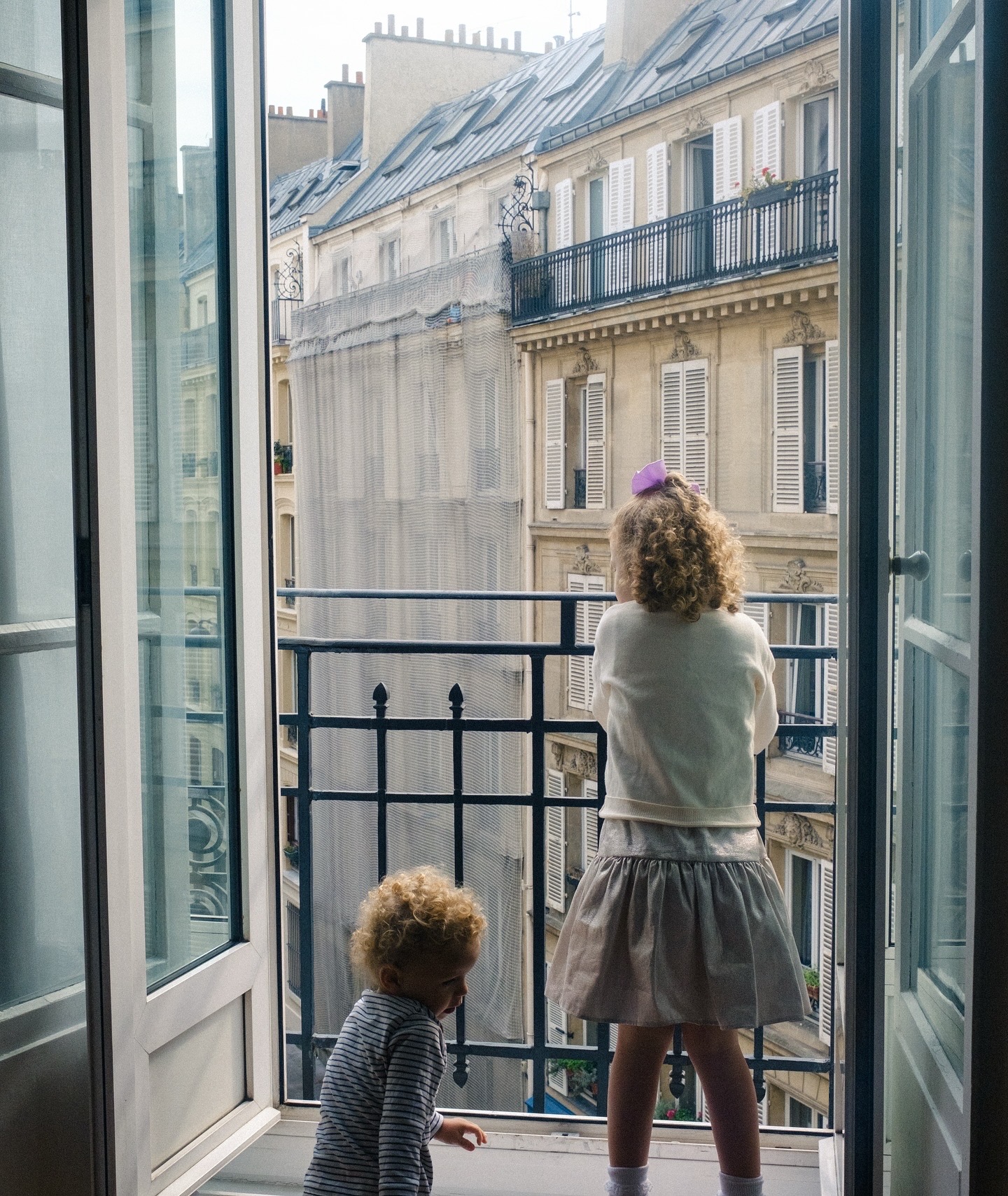 Children at Paris balcony